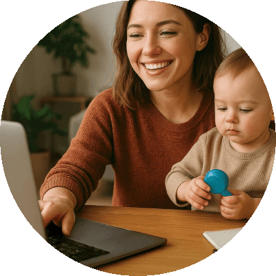 Man sitting smiling at his laptop while on a telehealth consult.